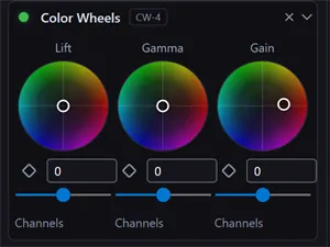 The Inspector showing the Color Wheels effect: Lift, Gamma, and Gain wheels side by side, each with a master slider and a Channels expander beneath — the Gain wheel's puck dragged toward orange