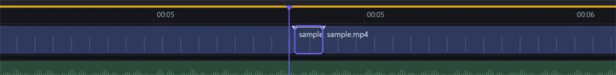 The timeline zoomed far in after Duplicate Frame: a tiny one-frame segment sits selected between the two halves of the original clip